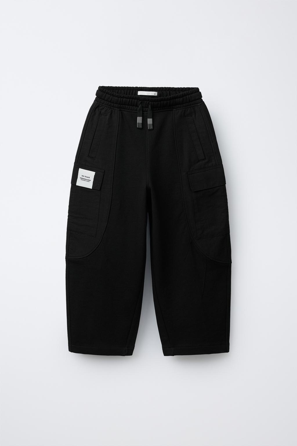 КОМБИНИРОВАННЫЕ БРЮКИ С НАШИВКОЙ