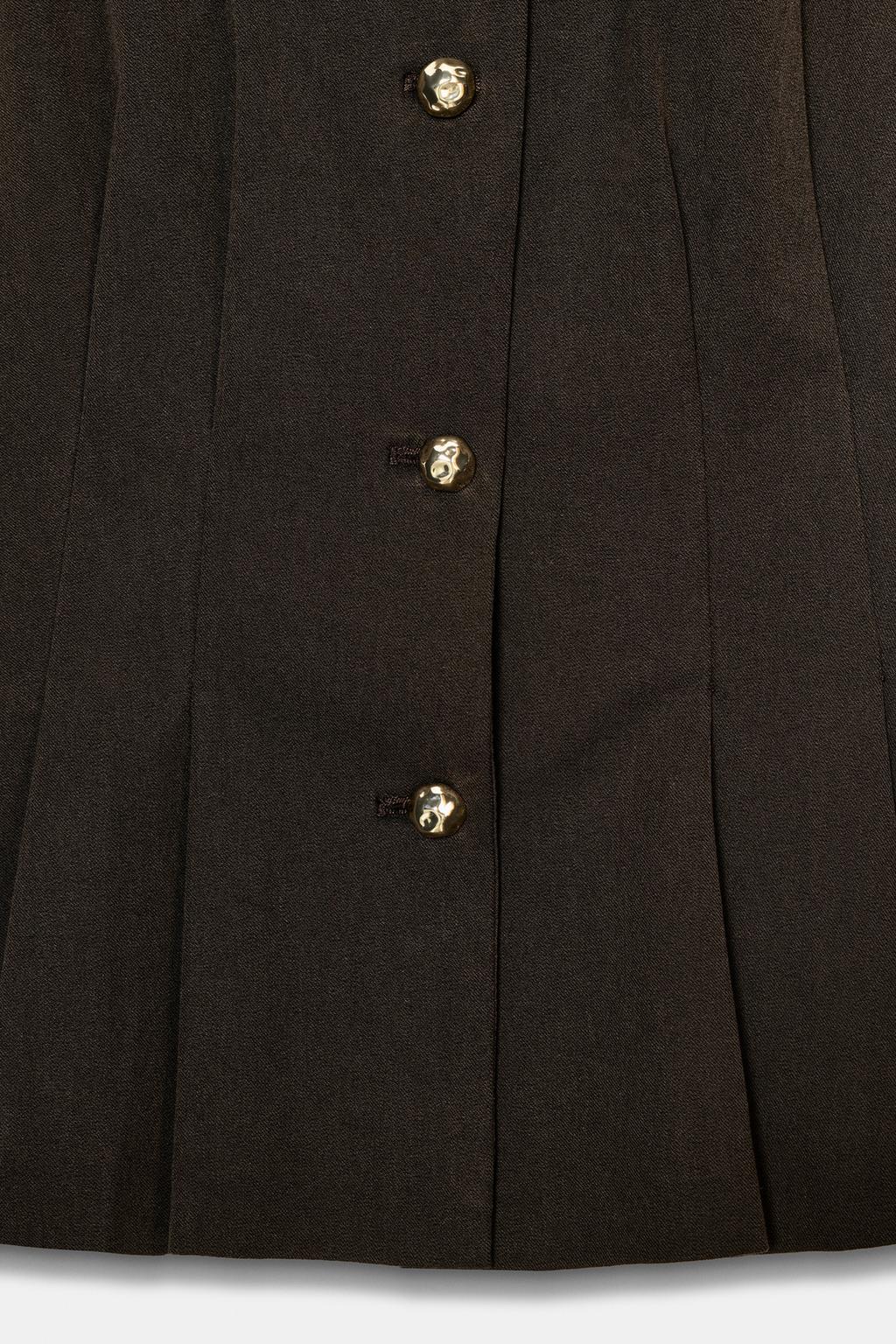 ЖИЛЕТ С БАСКОЙ И ЗАЩИПАМИ