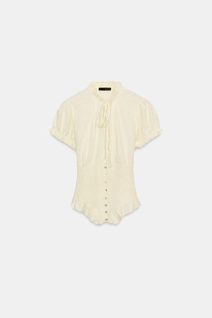 Топ из рельефной ткани с бантом- Заказать в России