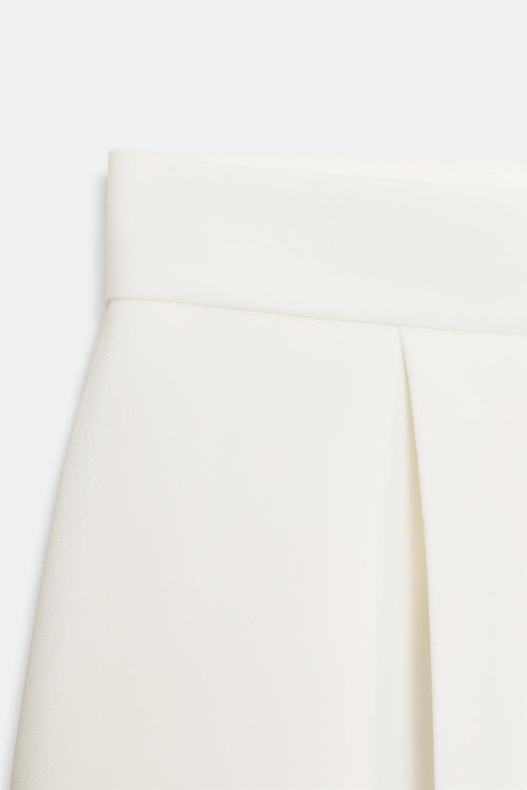 ШИРОКИЕ БРЮКИ С ЗАЩИПАМИ