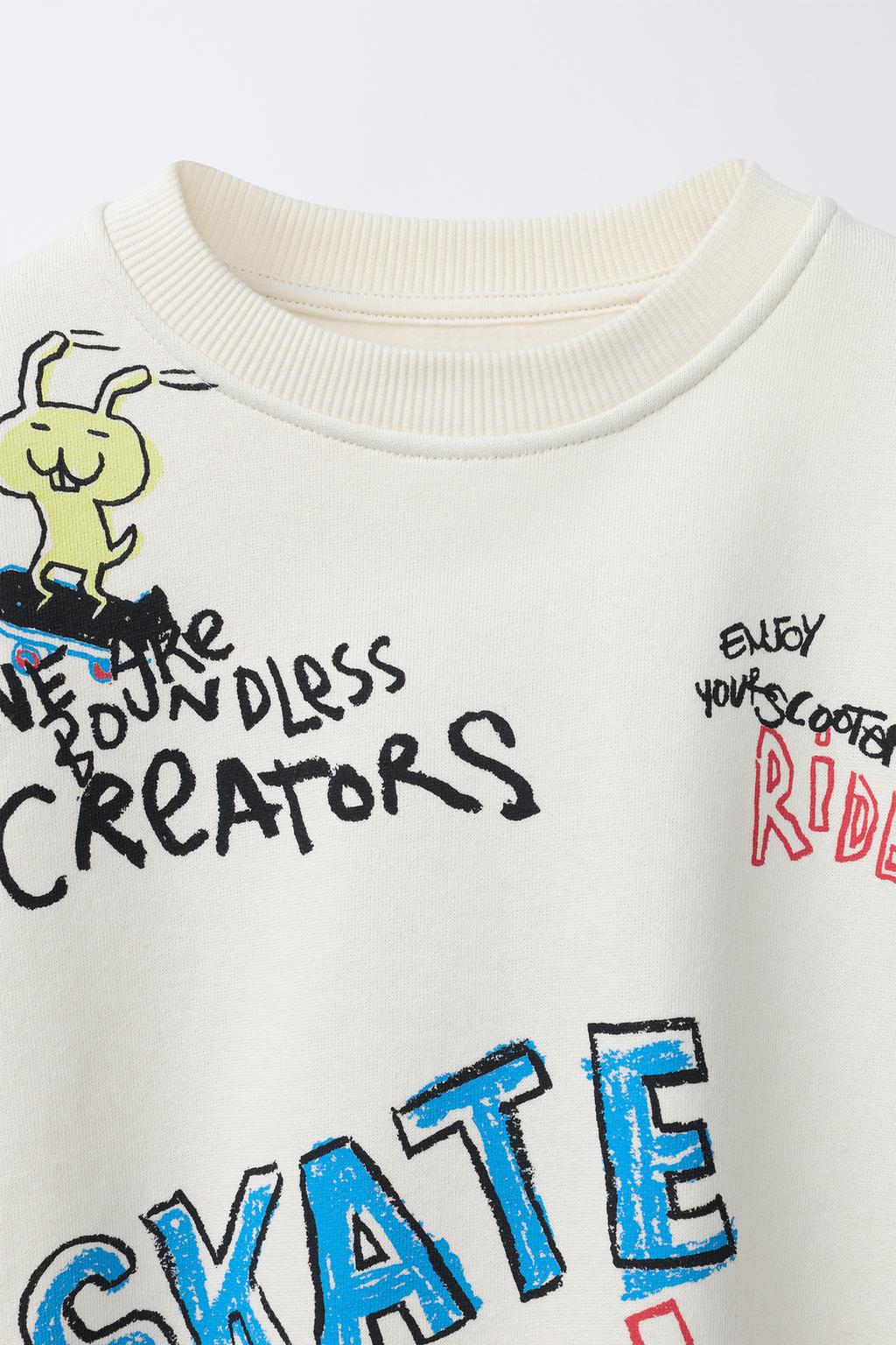 ТОЛСТОВКА С ПРИНТОМ «ГРАФФИТИ»