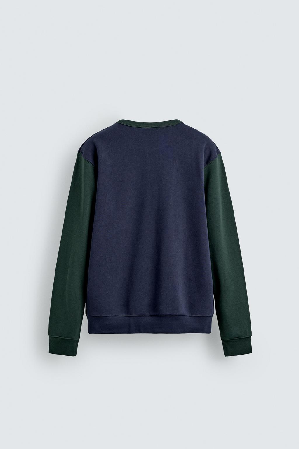 ТОЛСТОВКА С КРУГЛЫМ ВЫРЕЗОМ В СТИЛЕ КОЛОР-БЛОК