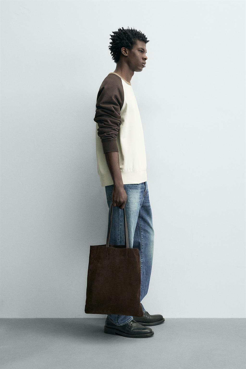 ТОЛСТОВКА С КОНТРАСТНЫМИ ВСТАВКАМИ И КРУГЛЫМ ВЫРЕЗОМ