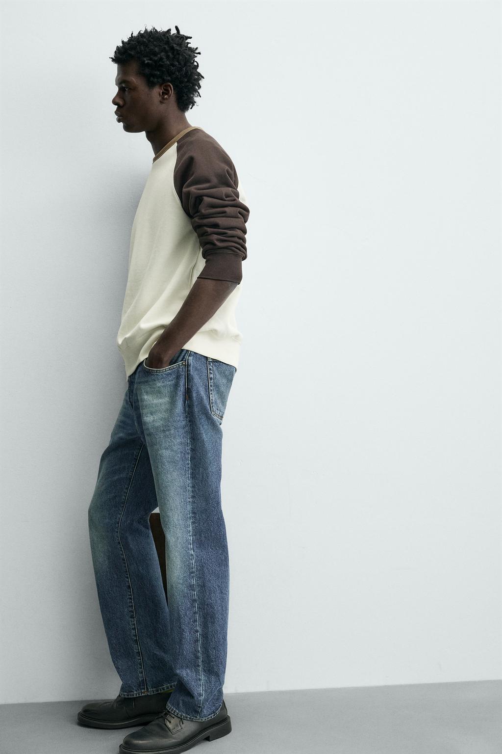 ТОЛСТОВКА С КОНТРАСТНЫМИ ВСТАВКАМИ И КРУГЛЫМ ВЫРЕЗОМ