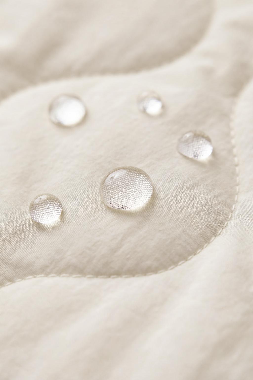 СТЕГАНАЯ КУРТКА С БАНТАМИ