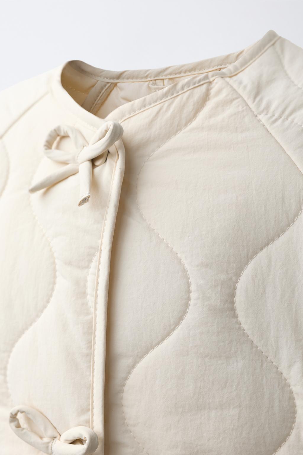 СТЕГАНАЯ КУРТКА С БАНТАМИ