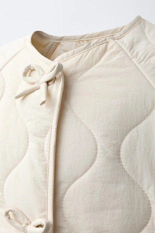 Стеганая куртка с бантами- Заказать в России