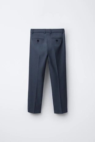 Костюмные брюки с рельефным узором- Заказать в России