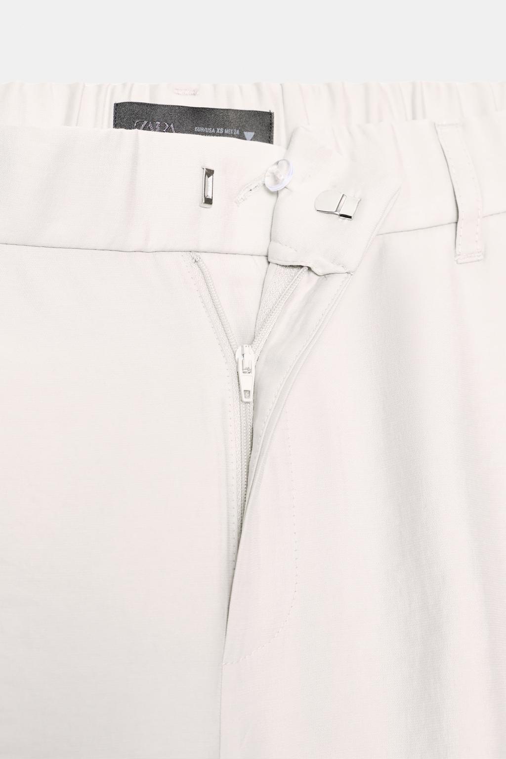 СТРУЯЩИЕСЯ БРЮКИ СО СКЛАДКАМИ