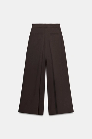 Брюки палаццо с золотой пуговицей- Заказать в России