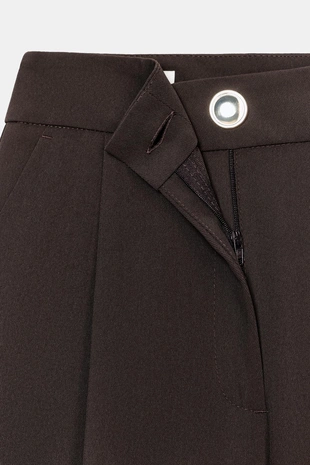 Брюки палаццо с золотой пуговицей- Заказать в России