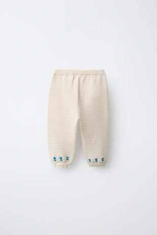 Брюки с вышитыми цветами и кружевом- Заказать в России