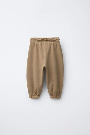 Брюки-джоггеры GARMENT DYE с нашивкой- Заказать в России