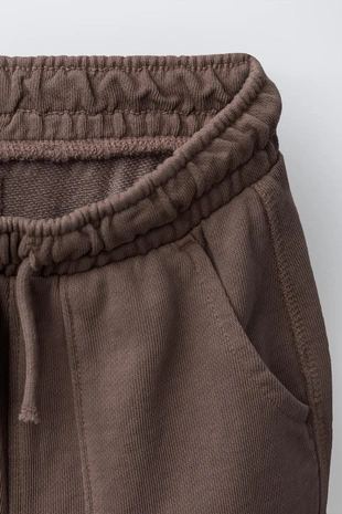 Брюки-джоггеры GARMENT DYE с нашивкой