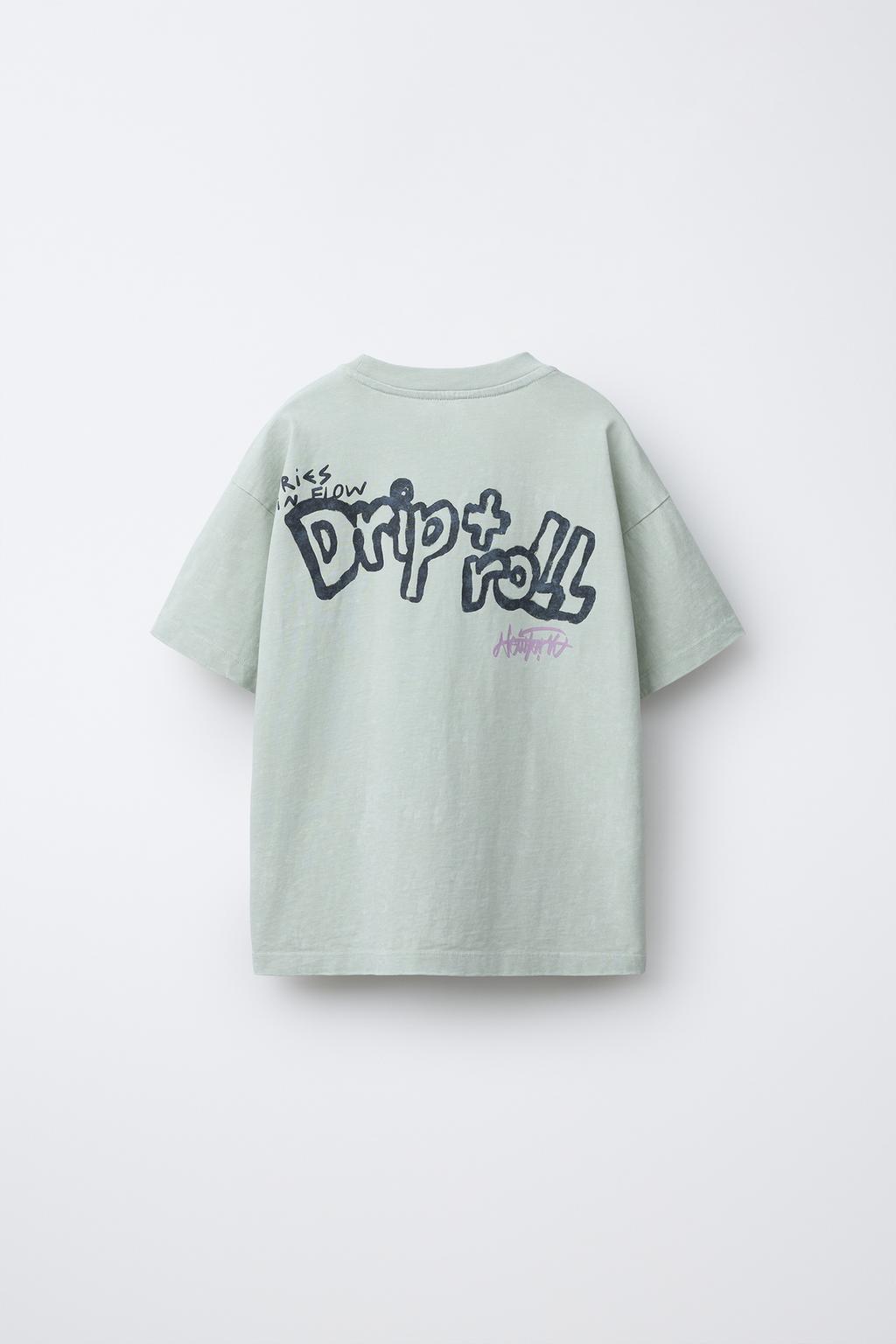 ФУТБОЛКА С ЭФФЕКТОМ ПОТЕРТОСТИ И НАШИВКАМИ