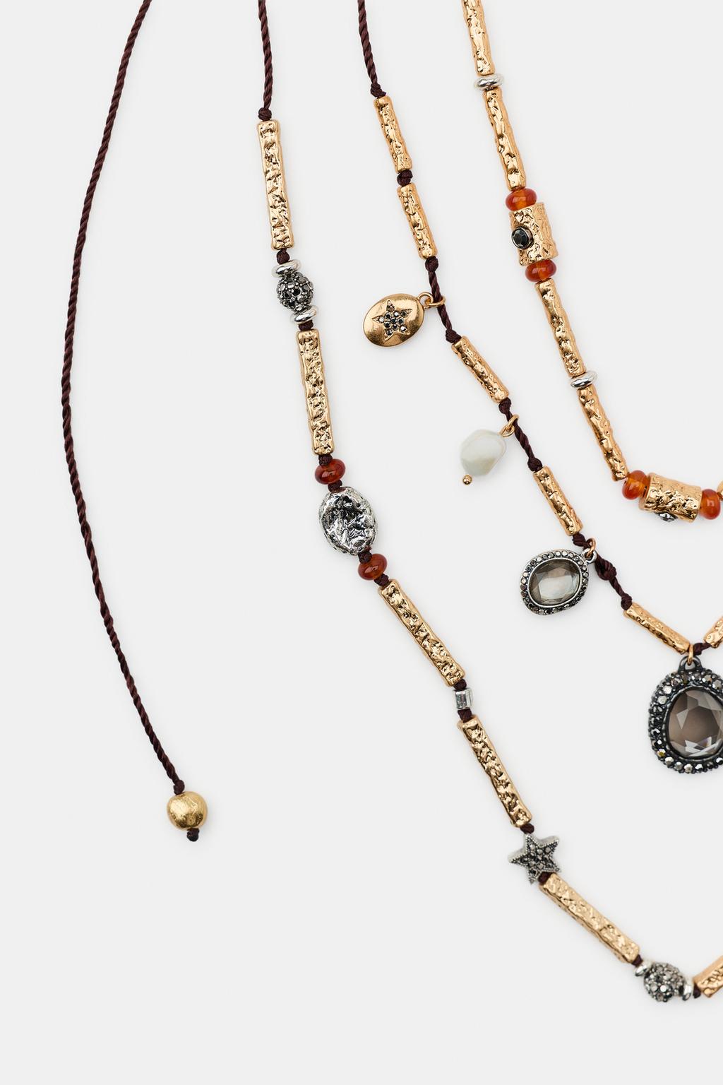 Набор из 3 шнурковых ожерелий с подвесками и драгоценными камнями