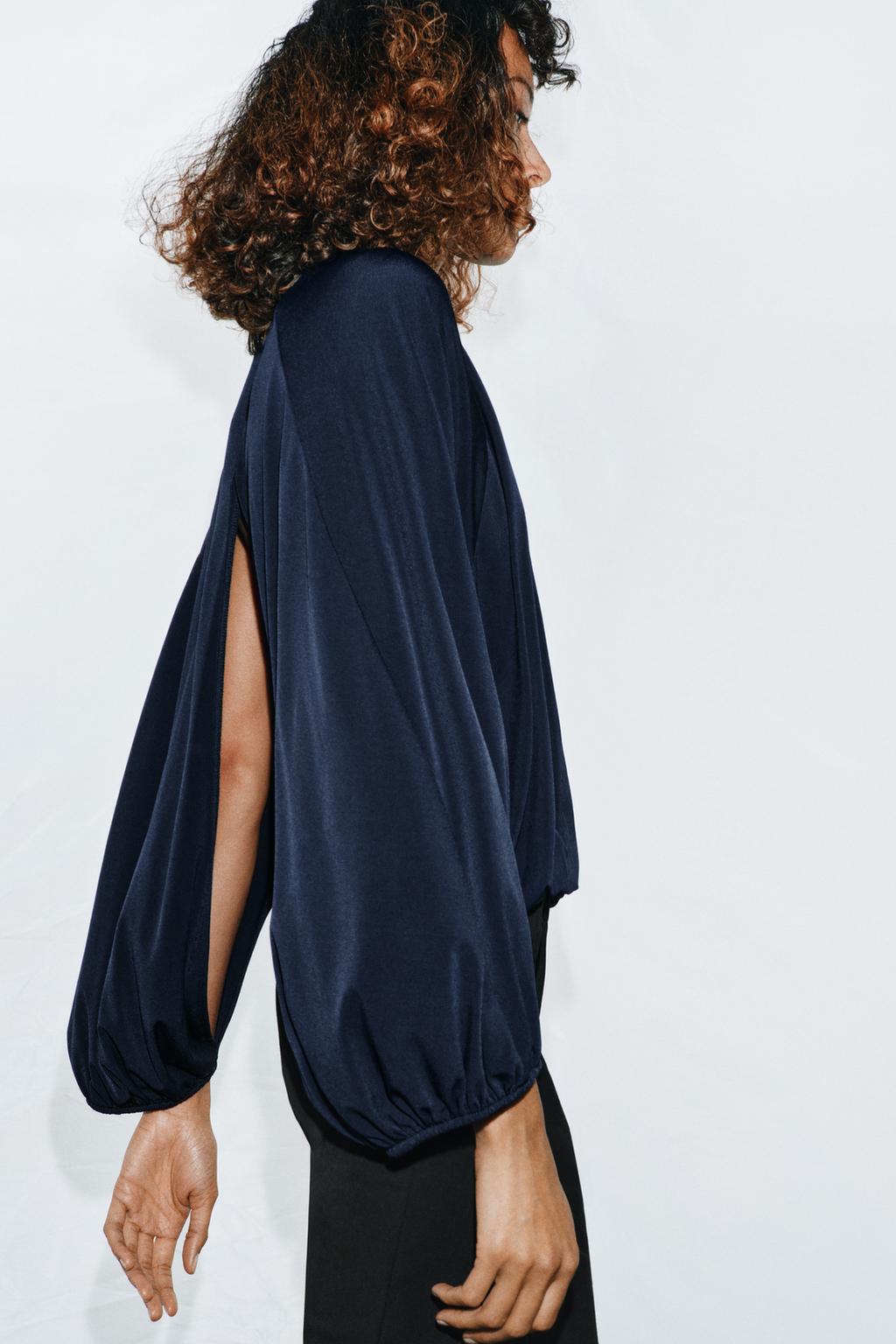 ТОП С ОБЪЕМНЫМИ РУКАВАМИ И РАЗРЕЗАМИ