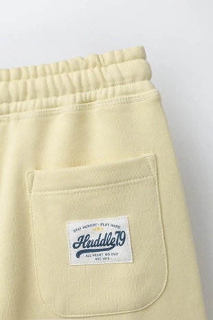 Шорты-джоггеры с надписью- Заказать в России