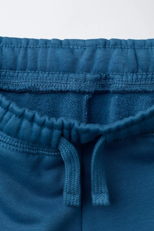 Брюки-джоггеры с надписью и этикеткой- Заказать в России