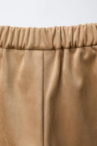 Юбка-шорты из искусственной замши с заклепками- Заказать в России