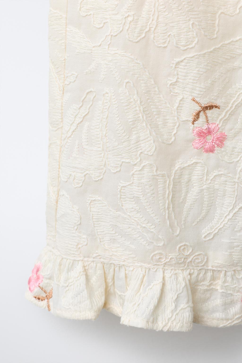 БРЮКИ С ВЫШИВКОЙ ЦВЕТОВ