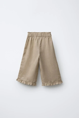 Брюки из льна с вышитыми цветами- Заказать в России