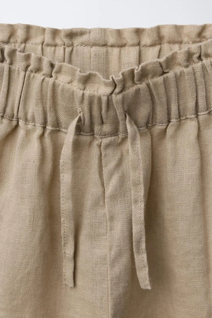 Брюки из льна с вышитыми цветами- Заказать в России