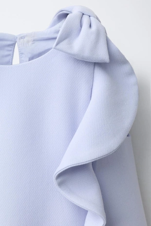 Платье с воланами и бантами- Заказать в России