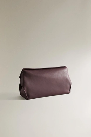 Кожаная косметичка минималистичного дизайна- Заказать в России