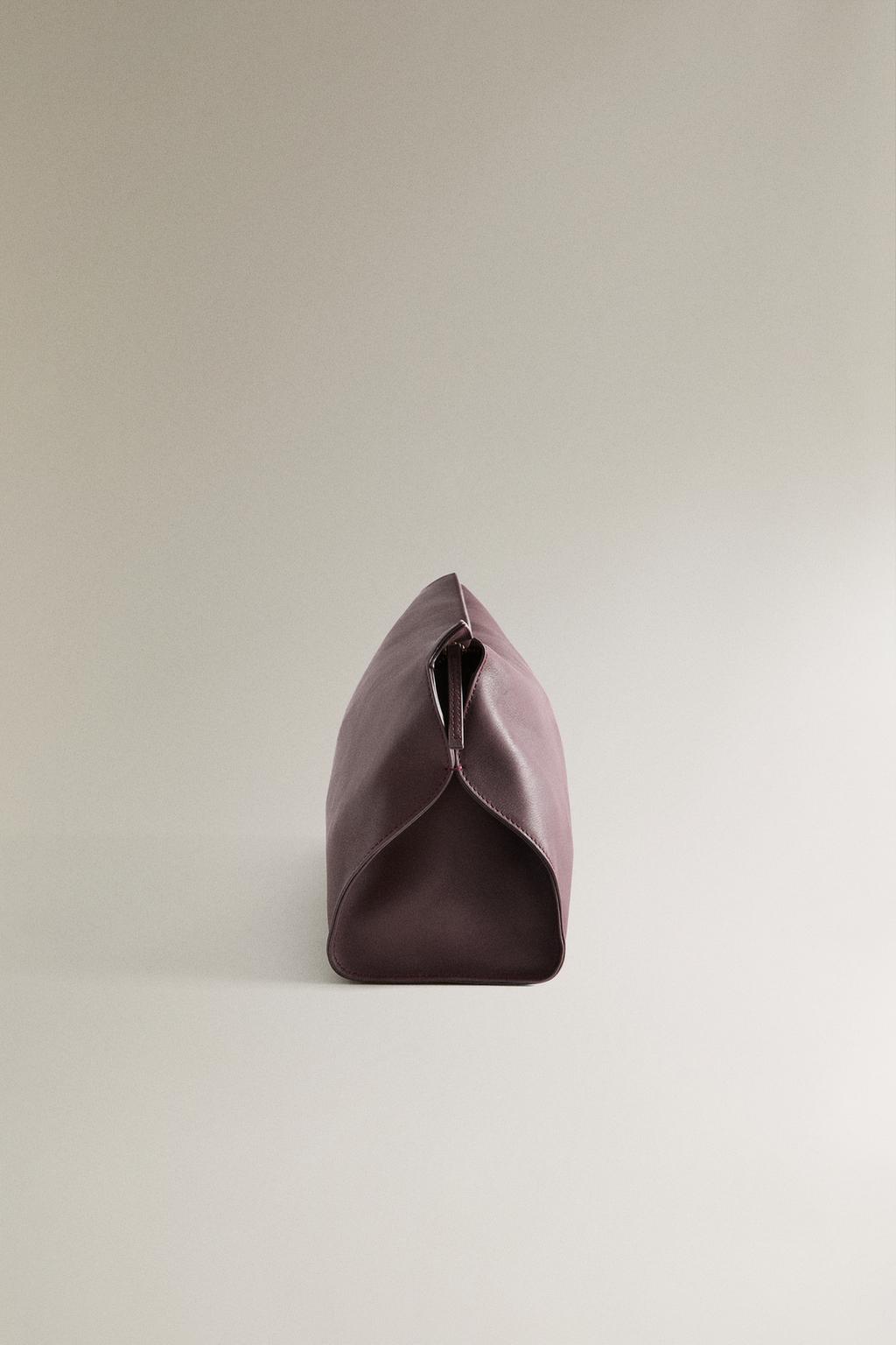 Кожаная косметичка минималистичного дизайна