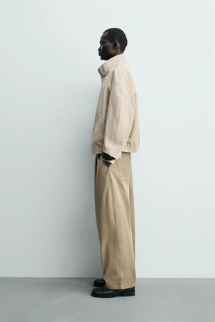 Брюки WIDE FIT со складками- Заказать в России