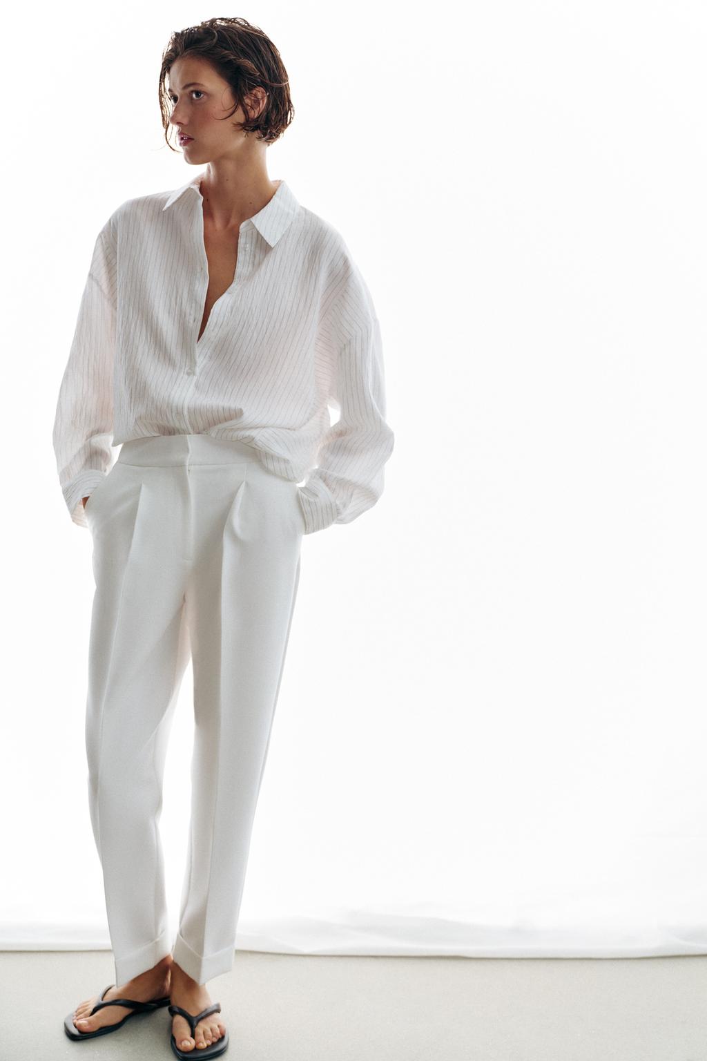 БРЮКИ С ОТВОРОТАМИ И ЗАЩИПАМИ