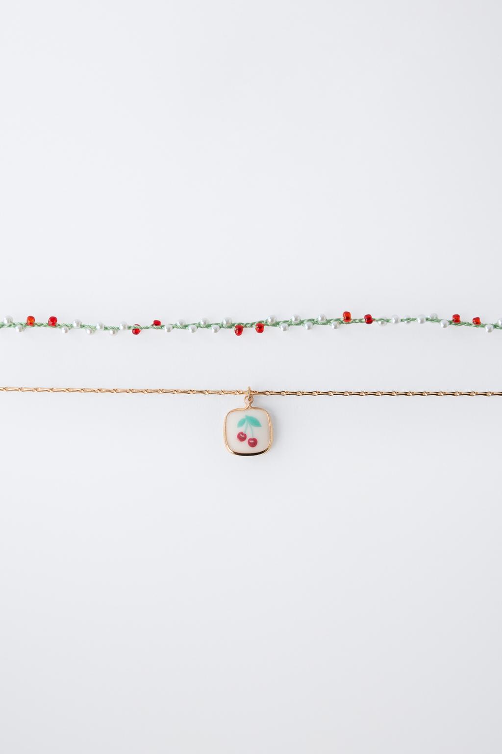 НАБОР ИЗ ДВУХ ОЖЕРЕЛИЙ С БУСИНАМИ И ВИШЕНКАМИ