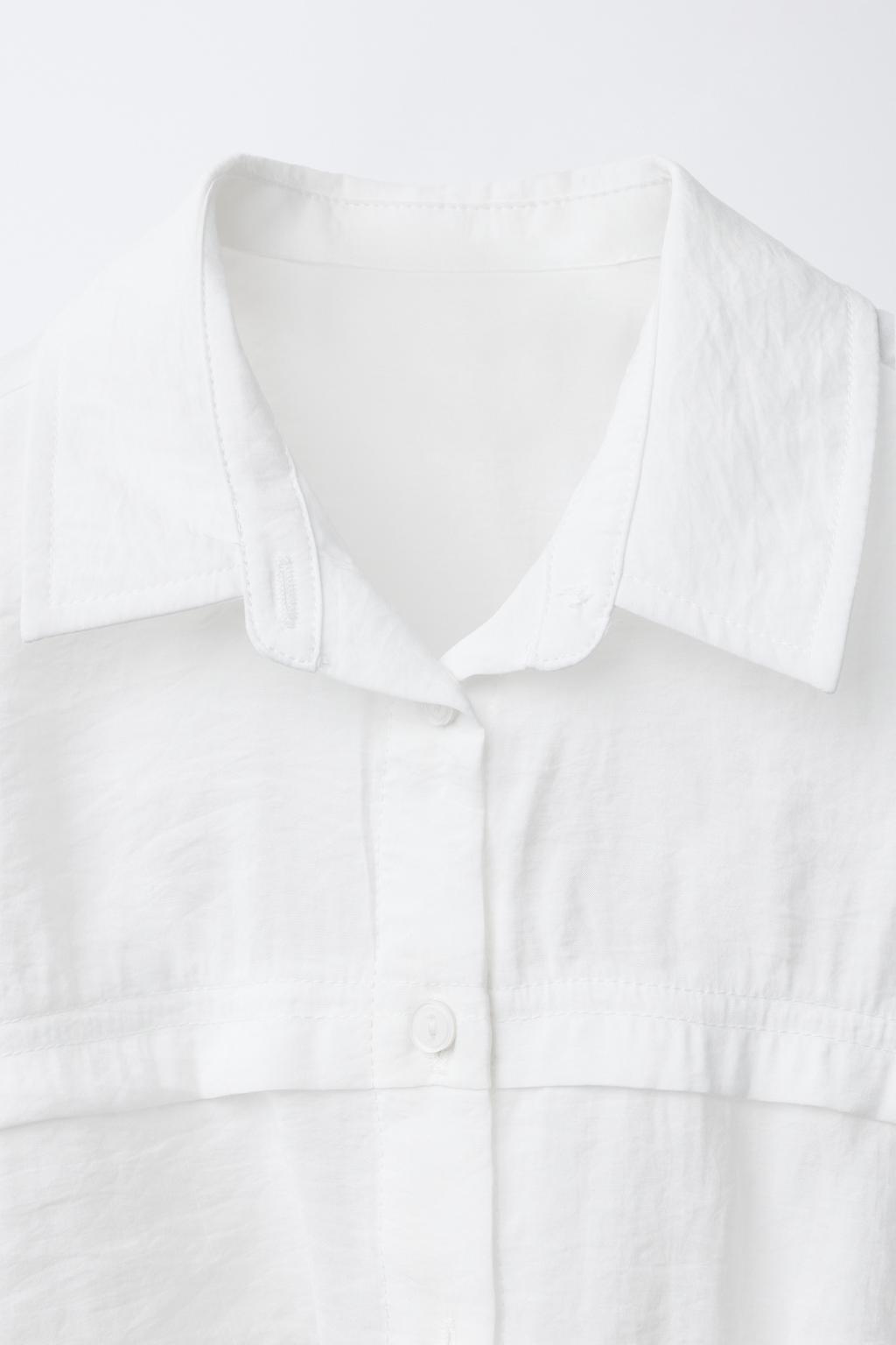 РУБАШКА СТРУЯЩЕГОСЯ ПОКРОЯ С УЗЛОМ