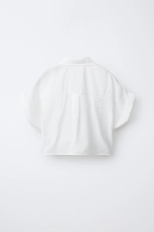 Рубашка струящегося покроя с узлом- Заказать в России