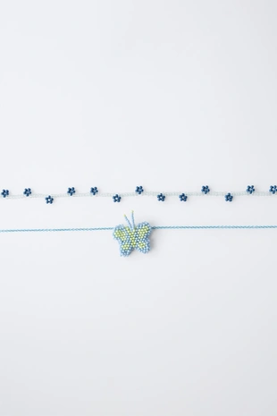 Набор из двух ожерелий с бусинами, бабочкой и цветами- Заказать в России