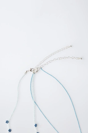 Набор из двух ожерелий с бусинами, бабочкой и цветами- Заказать в России