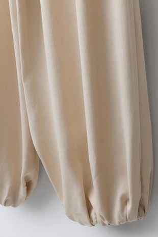 Брюки бомбачо с защипами- Заказать в России