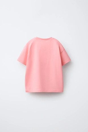 Футболка с карманом и вышивкой