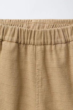 Шорты-бермуды из ткани в деревенском стиле- Заказать в России