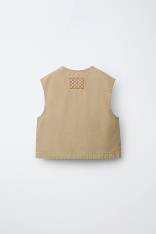 Жилет с нашивкой- Заказать в России