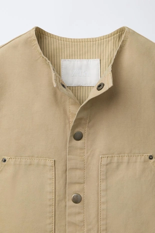 Жилет с нашивкой- Заказать в России