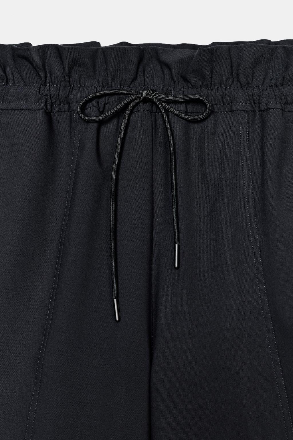 БЕРМУДЫ С ВОЛАНАМИ НА ТАЛИИ