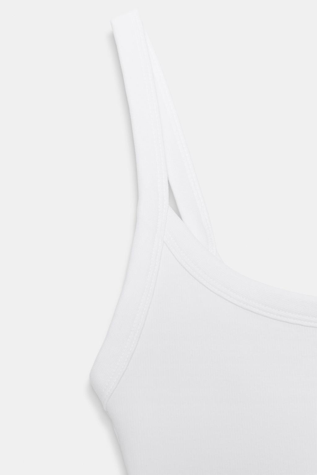 ХЛОПКОВОЕ БОДИ С БРЕТЕЛЯМИ