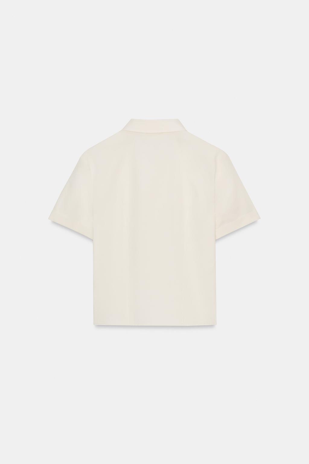 РУБАШКА ИЗ ПОПЛИНА С ВОЛАНАМИ И ЗАКЛЕПКАМИ