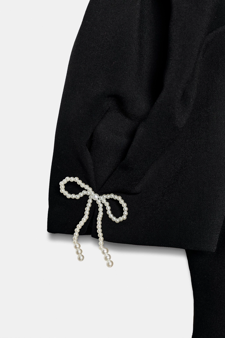 Топ с объемными рукавами