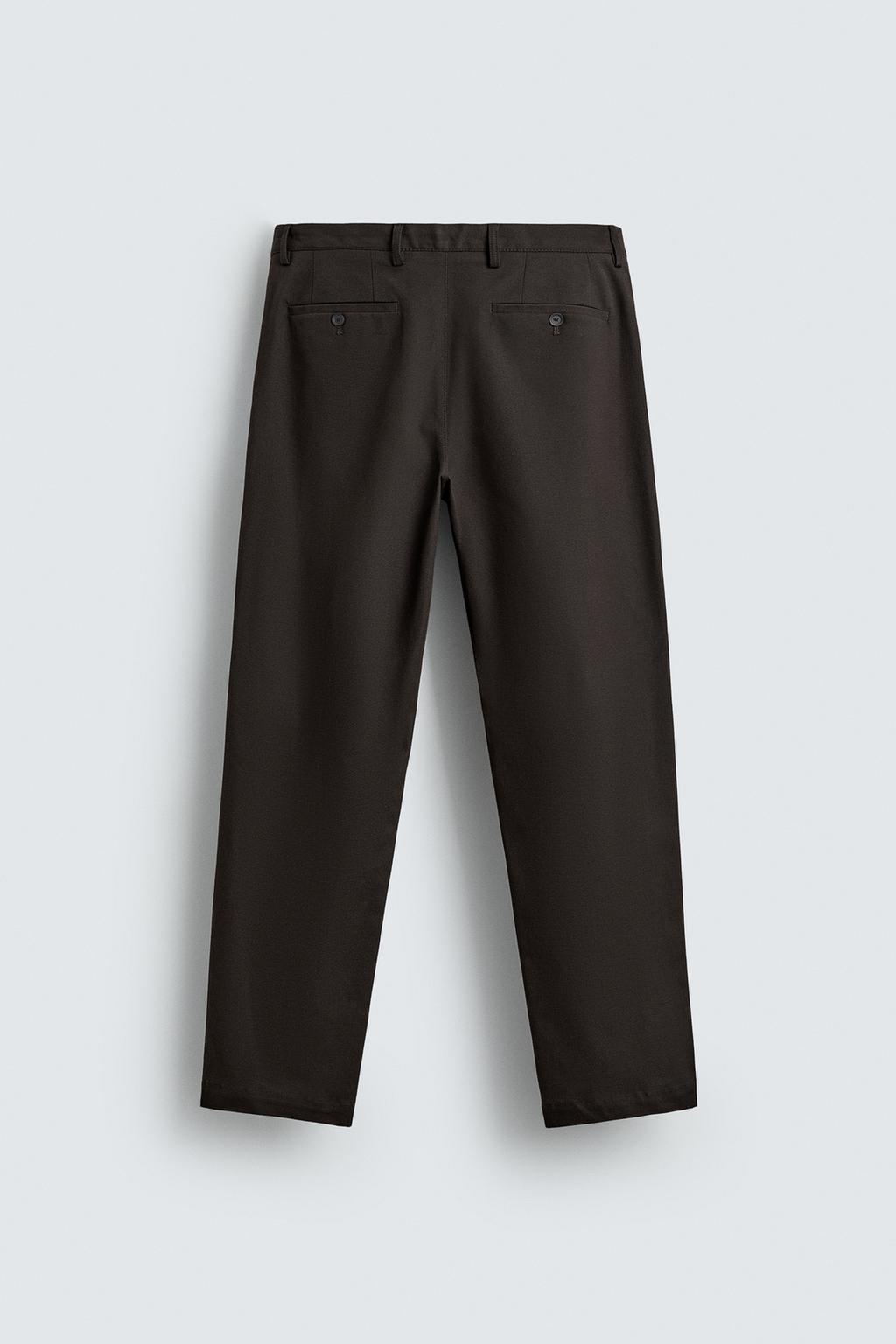 БРЮКИ СО СКЛАДКАМИ ИЗ РЕЛЬЕФНОЙ ТКАНИ