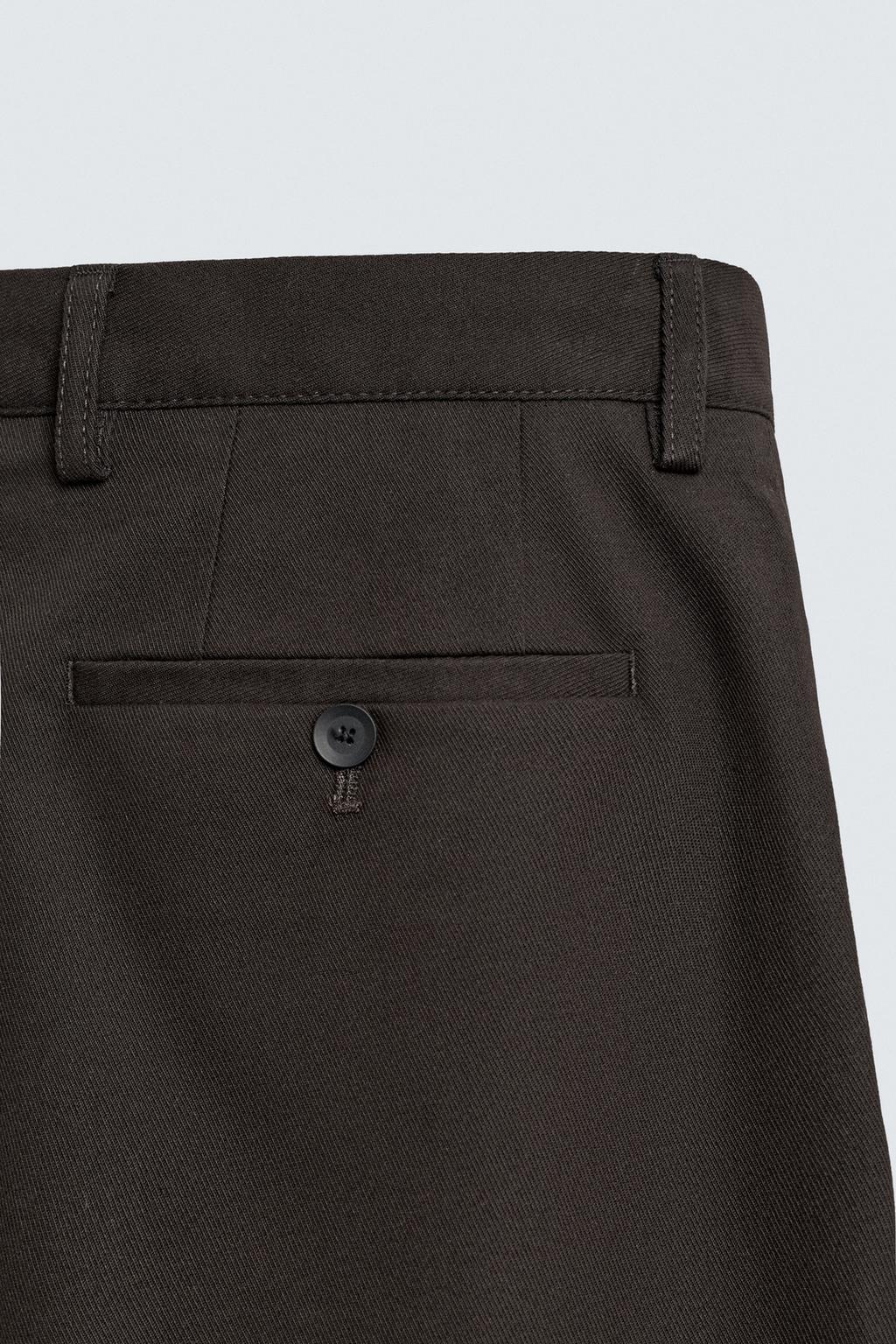 БРЮКИ СО СКЛАДКАМИ ИЗ РЕЛЬЕФНОЙ ТКАНИ