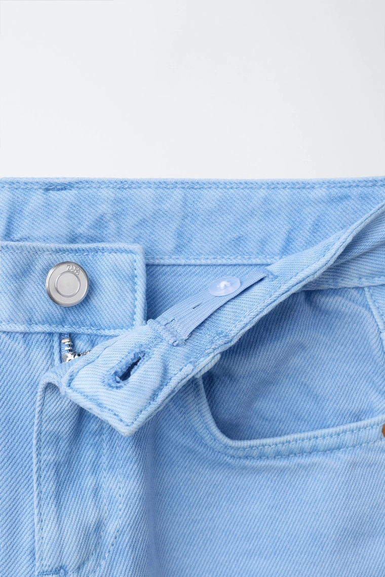 Джинсы с широкими укороченными штанинами