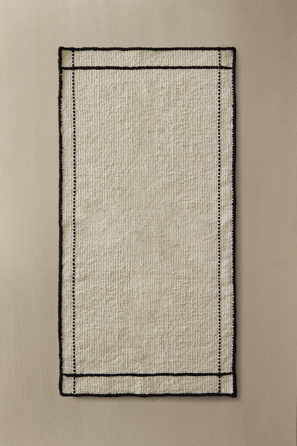 Коврик для ванны с отстрочкой по краю